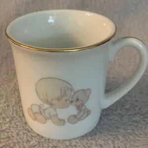 Precious Moments mini cup, 2.5 inches tall.